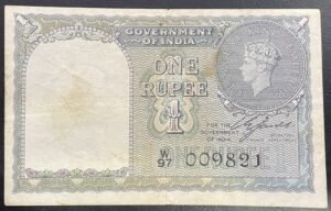 1940 Rupee 1 British India Banknote, KGV-I, Sign. C.E. Jones LOWER SERIAL NUMBER (W97 009821)